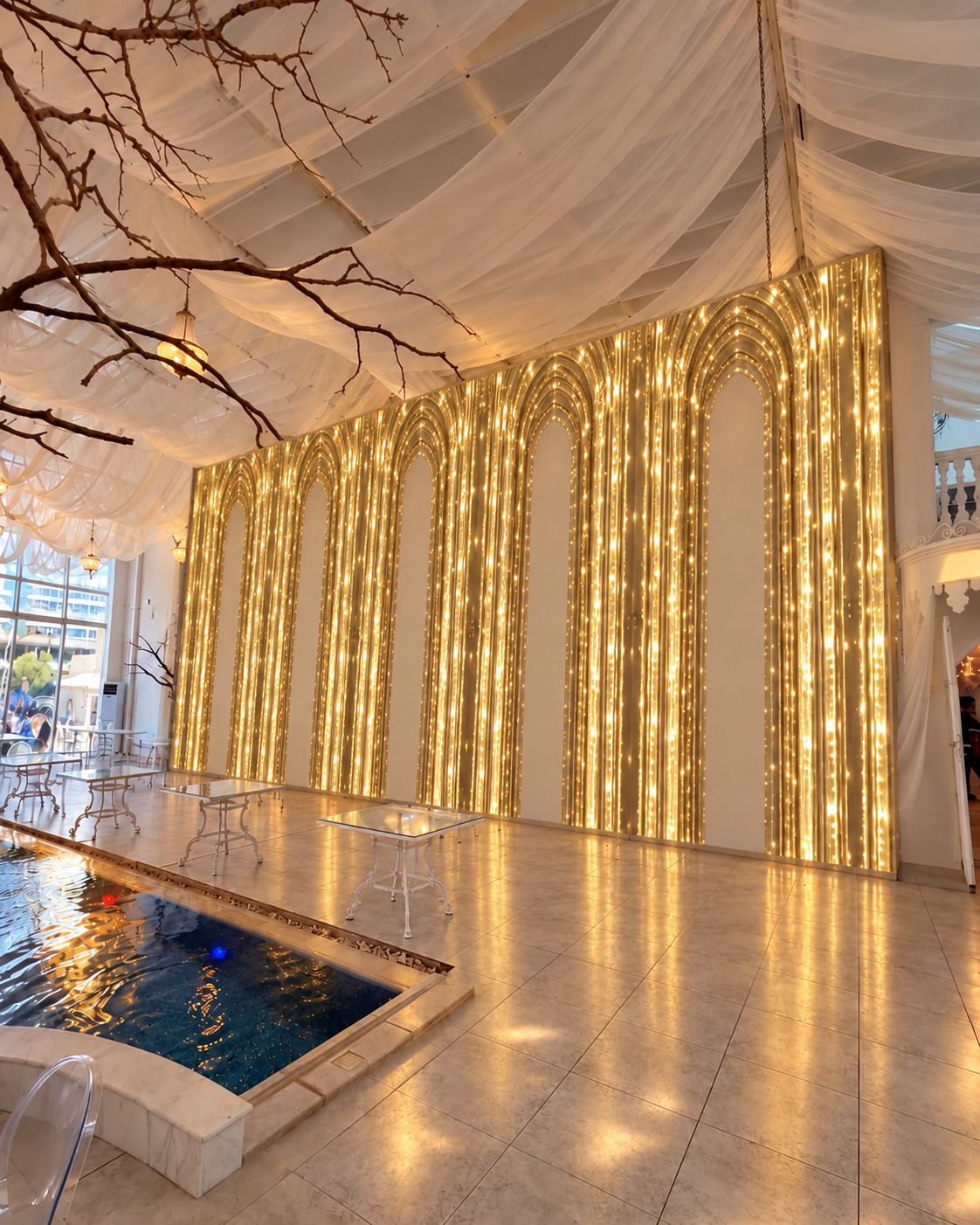 Perspective view of the gold illuminated arched wedding wall